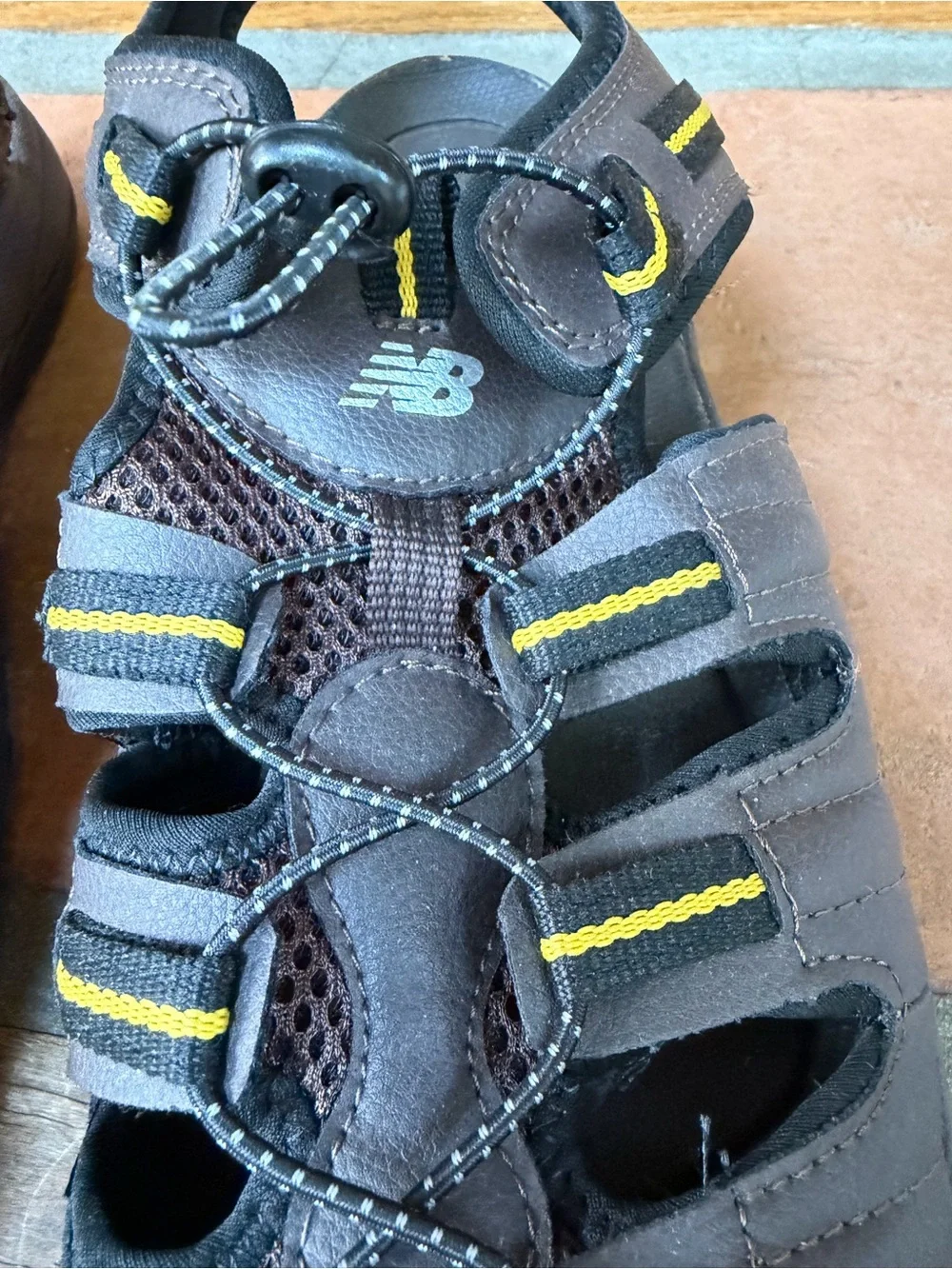 New Balance Brown & Yellow Men’s Closed-Toe Outdoor Sandals